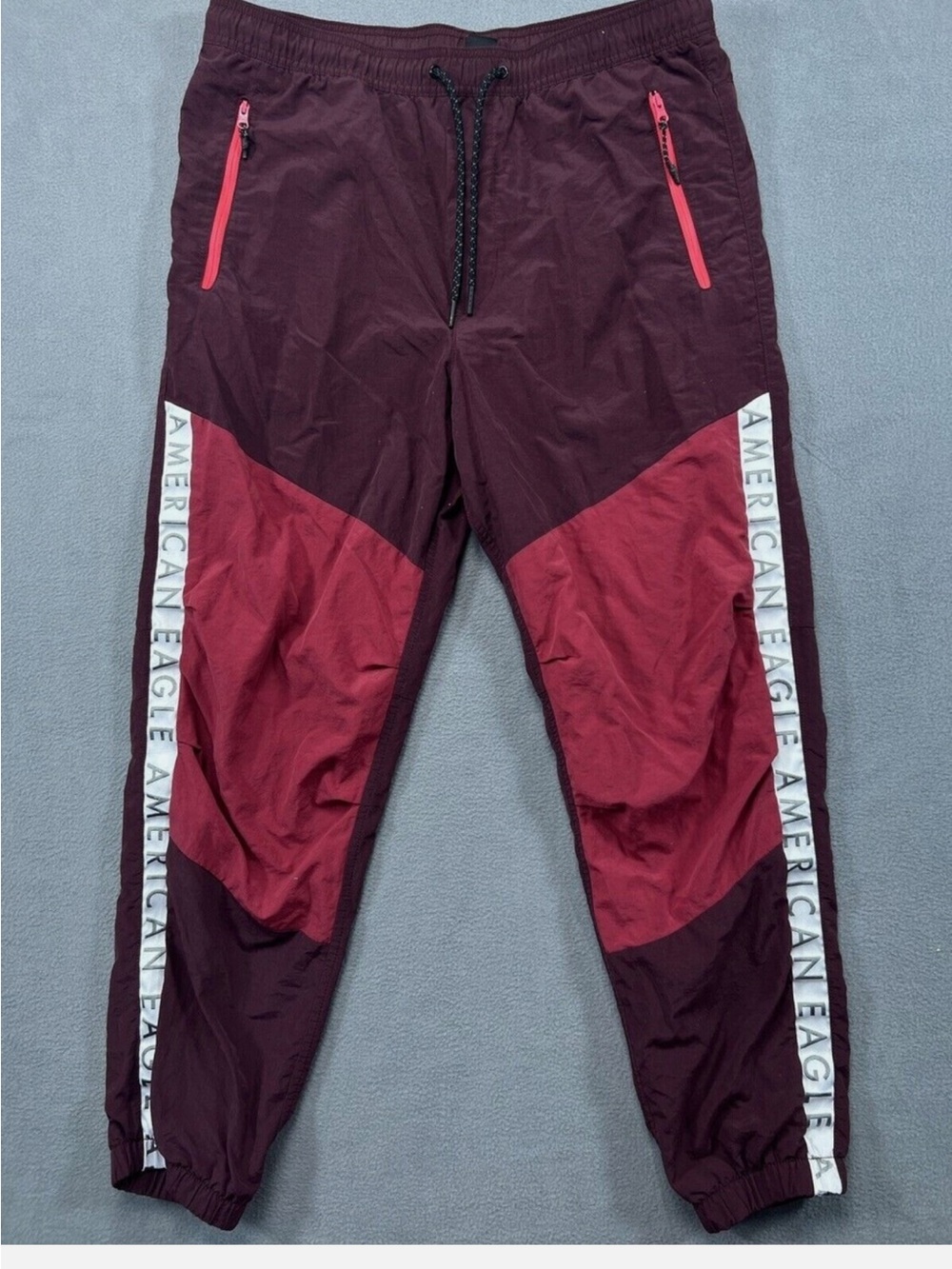 American Eagle Mens Windpants Joggers Red Maroon Nylon Drawstring Tapered Leg